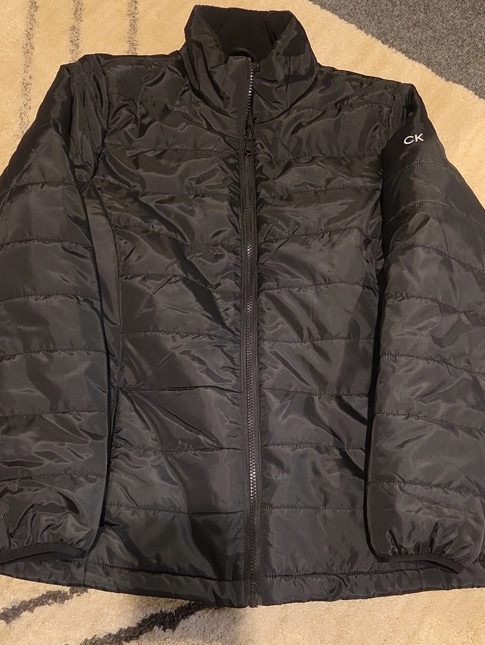 Calvin Klein Black Quilted Puffer Jacket with CK Sleeve Logo